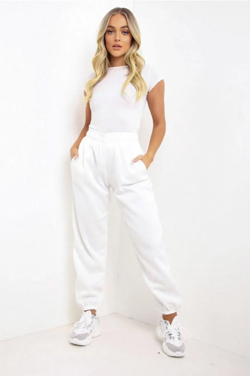 Pantalone tuta bianco con tasche e molla