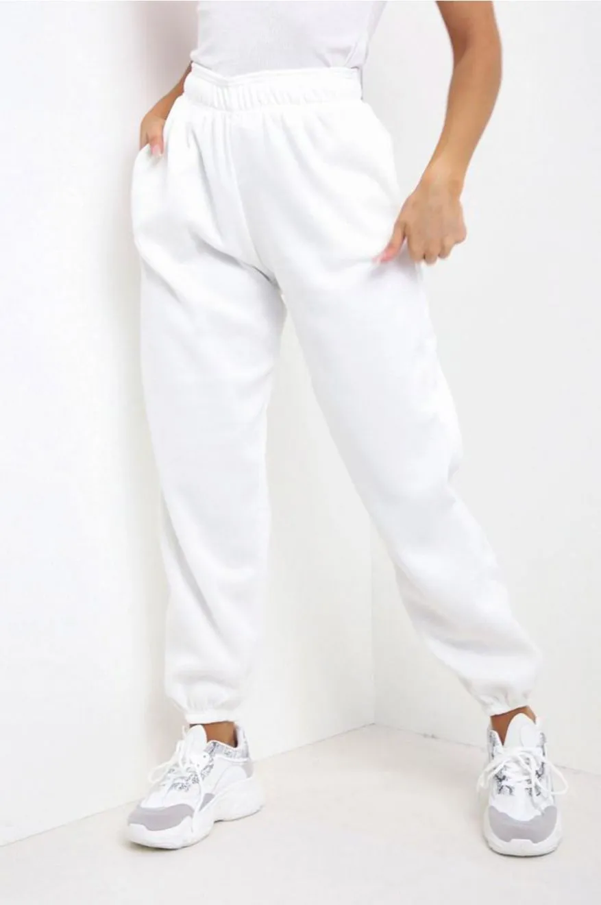 Pantalone tuta bianco con tasche e molla