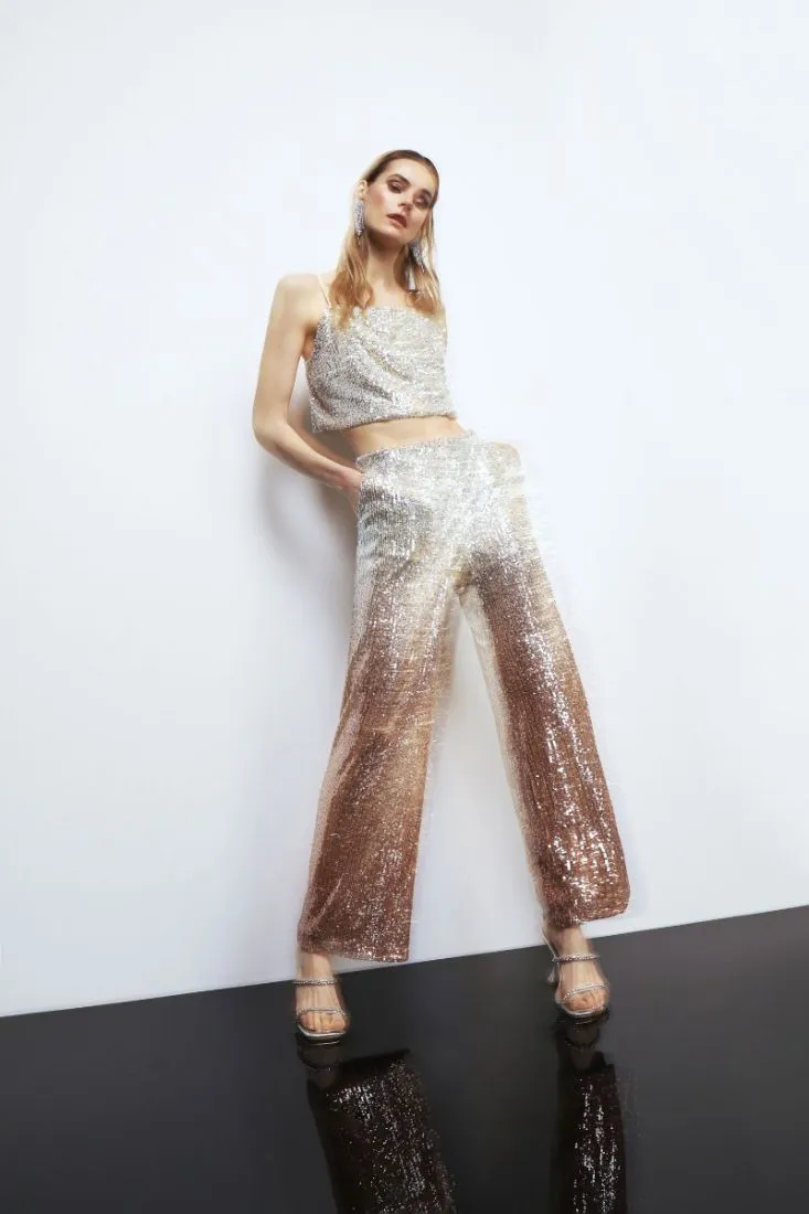 Pantaloni a palazzo in paillettes con tasche americane