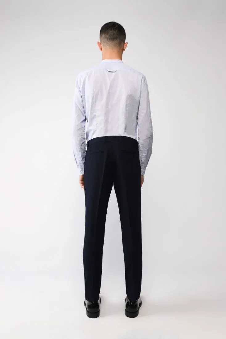 Pantaloni slim-fit monocolour con piega stirata